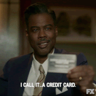 Man is showing off a credit card