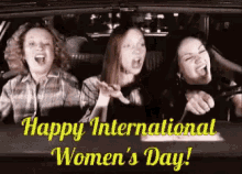 3 women celebrate International Women's Day in a car