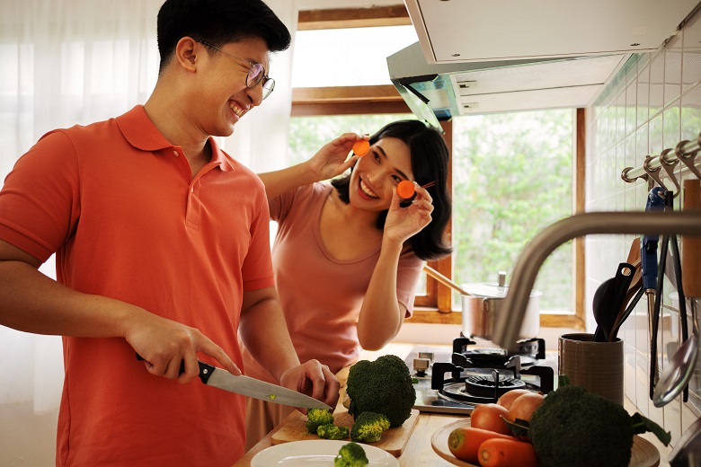 Friends cooking in the kitchen