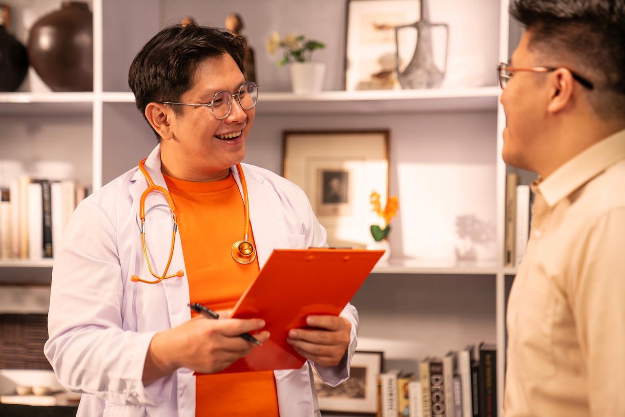 Doctor speaking with his patient at the clinic