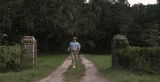 Man running quickly down a road