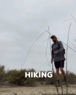 A hiker dances while hiking