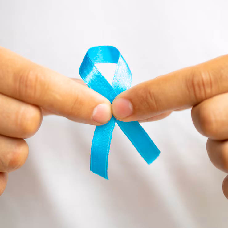 Men-holding-a-blue-ribbon-to-represent-prostate-cancer-awareness.avif